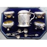 A silver plated condiments set,