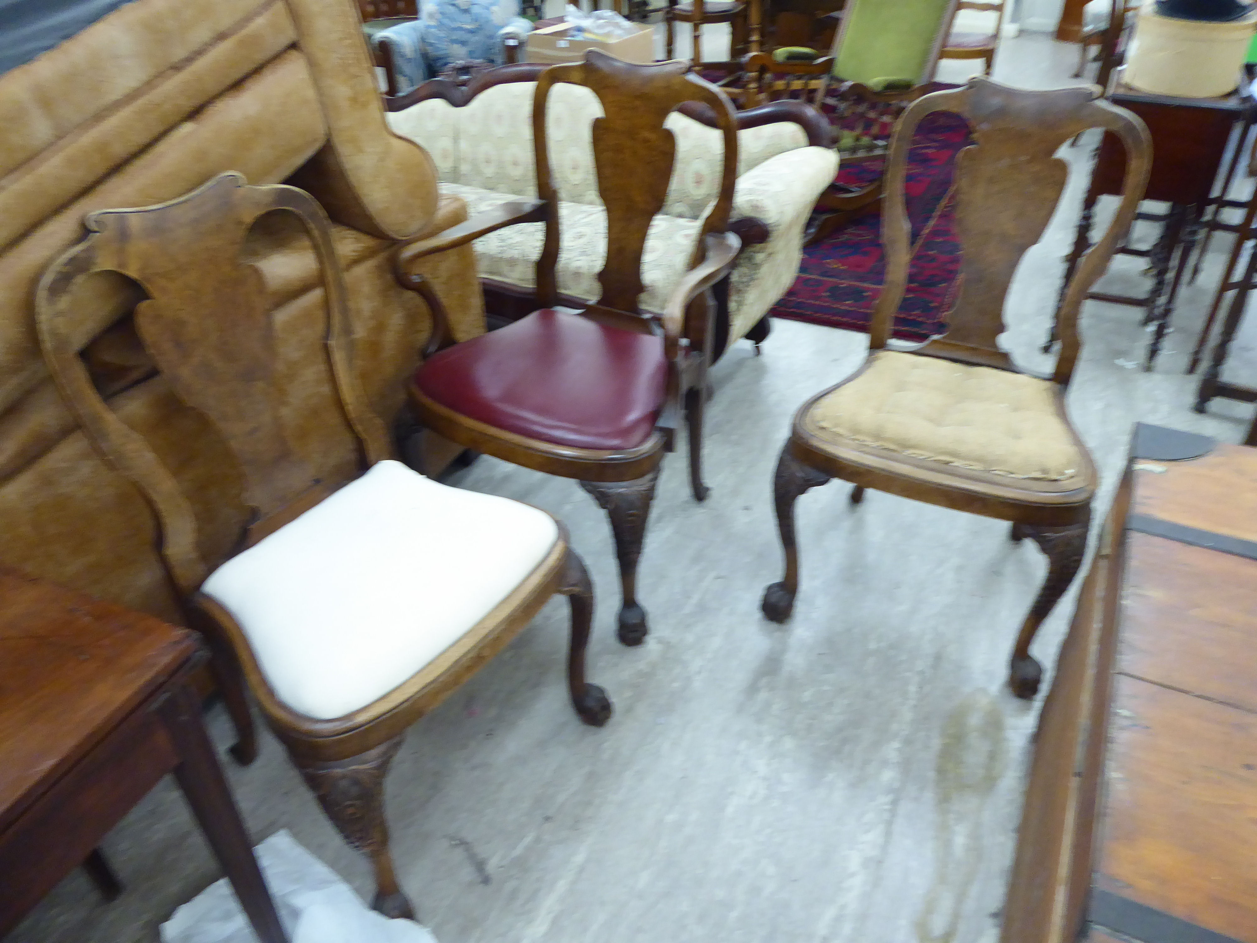 A matched set of three late 19thC Victorian Queen Anne style, walnut framed dining chairs,