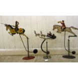 Three early 20thC painted tinplate and steel, counter balanced toy figures,