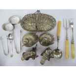 Tableware: to include a silver and ivory handled bread fork and a pair of oval napkin rings mixed