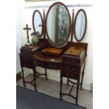 An Edwardian satinwood and ebony inlaid mahogany dressing table,