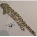 Two similar silver gatelink bracelets on heart shaped padlock clasps 11