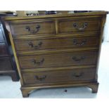A modern Georgian style string inlaid mahogany veneered dressing chest,