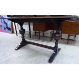 A 20thC Old English style oak refectory table, the solid top raised on carved, bulbous and block,