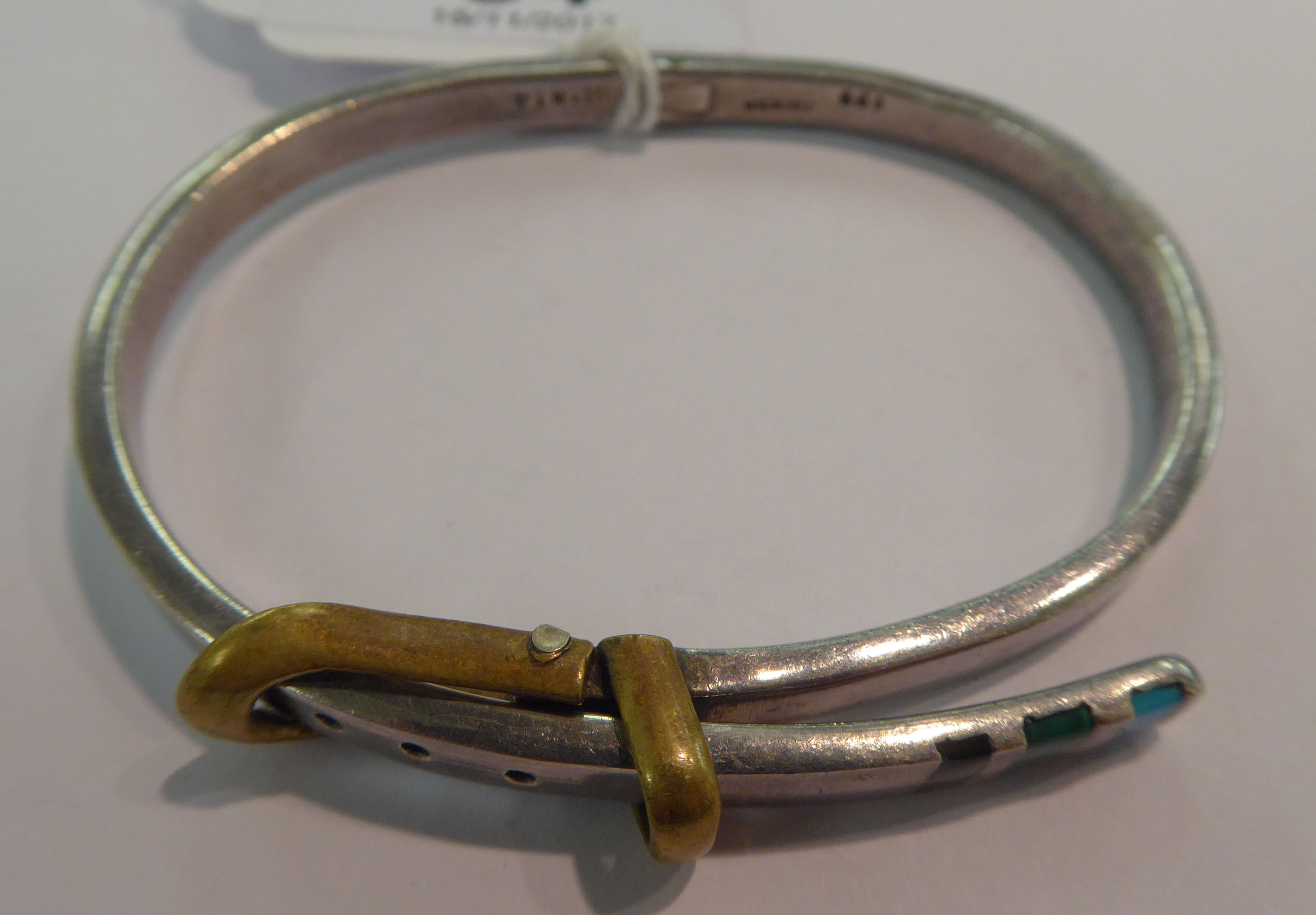 A buckled belt design, hinged silver bangle, set with turquoise, - Image 2 of 2