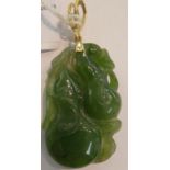 A Chinese carved jade pendant with a gold coloured metal loop 11