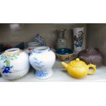 Modern Oriental ceramics: to include an earthenware teapot and various jars OS3
