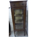 An Edwardian string inlaid crossbanded mahogany display cabinet with a single drawer,