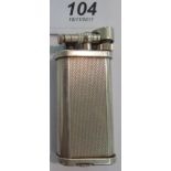 A 'vintage' Dunhill Unique silver coloured metal cased butane filled cigarette lighter 11