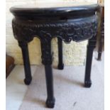 A late 19th/early 20thC Chinese hardwood jardiniere, the inset marble top raised on square,