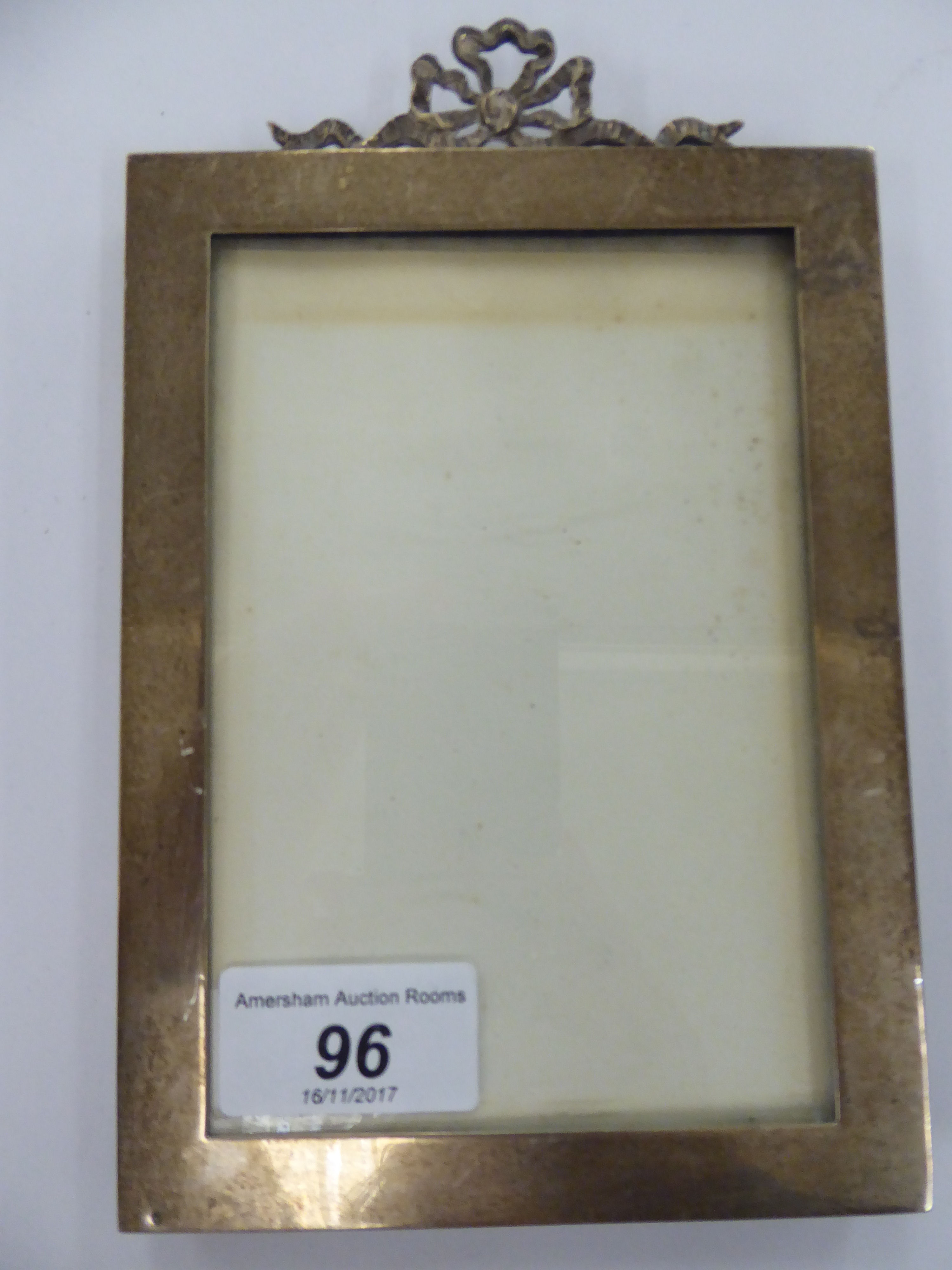 A Mappin & Webb silver photograph frame with a fabric covered back London 1911 5.5'' x 3.