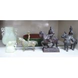 Asian 'antiques', viz. three cast bronze models, featuring mounted horsemen 6.5'', 6'' & 4.