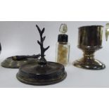 Two silver ring trees, on loaded bases; a silver vesta holder,