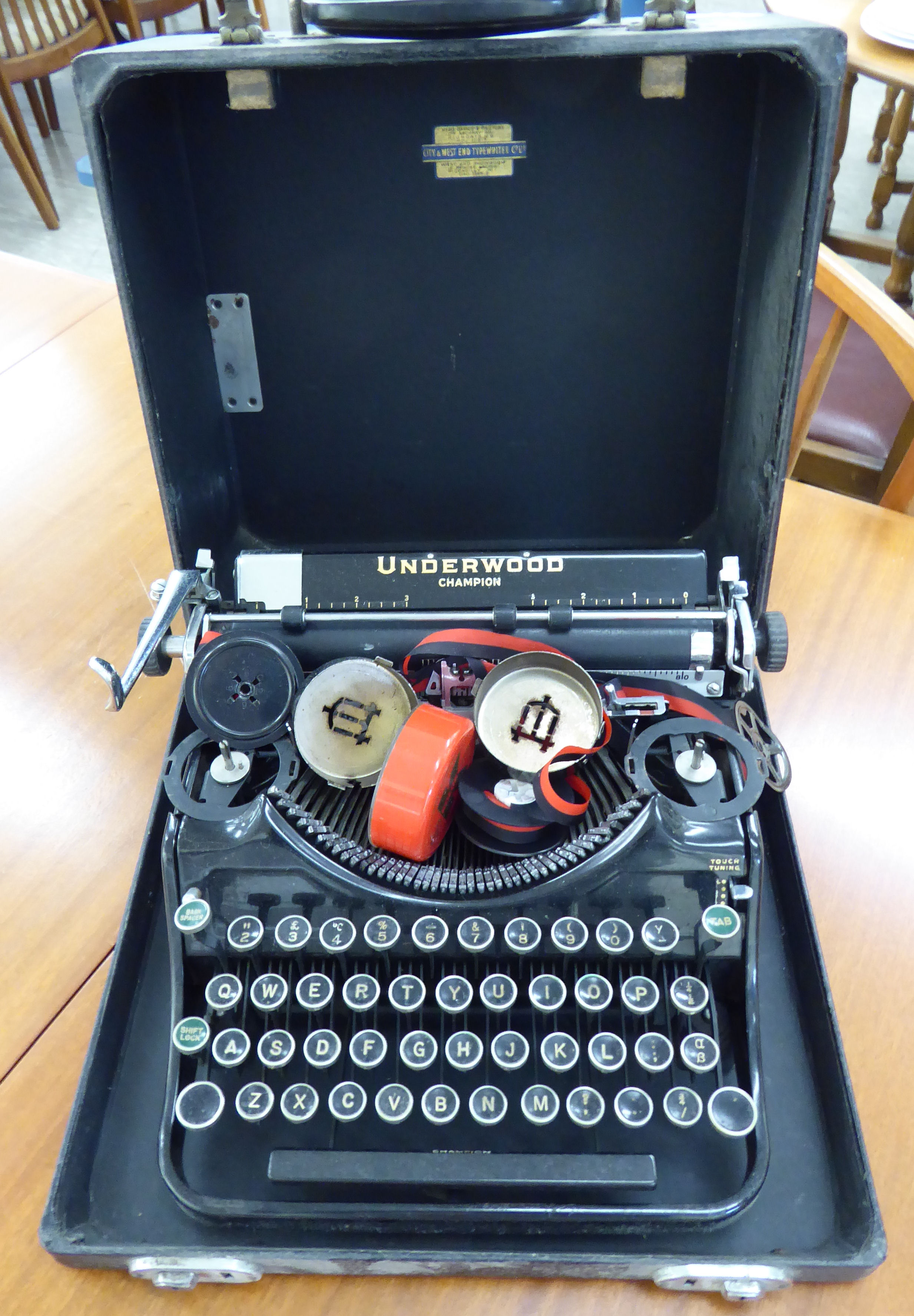 An Underwood Champion manual typewriter cased RAB