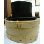 An AJ White black silk top hat (22'' inner circumference) LAB