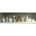 Eight Beswick china Beatrix Potter models: to include 'Squirrel Nutkin' bears a BP2 stamp 3.