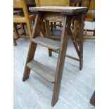 A pair of 1930s oak framed folding,