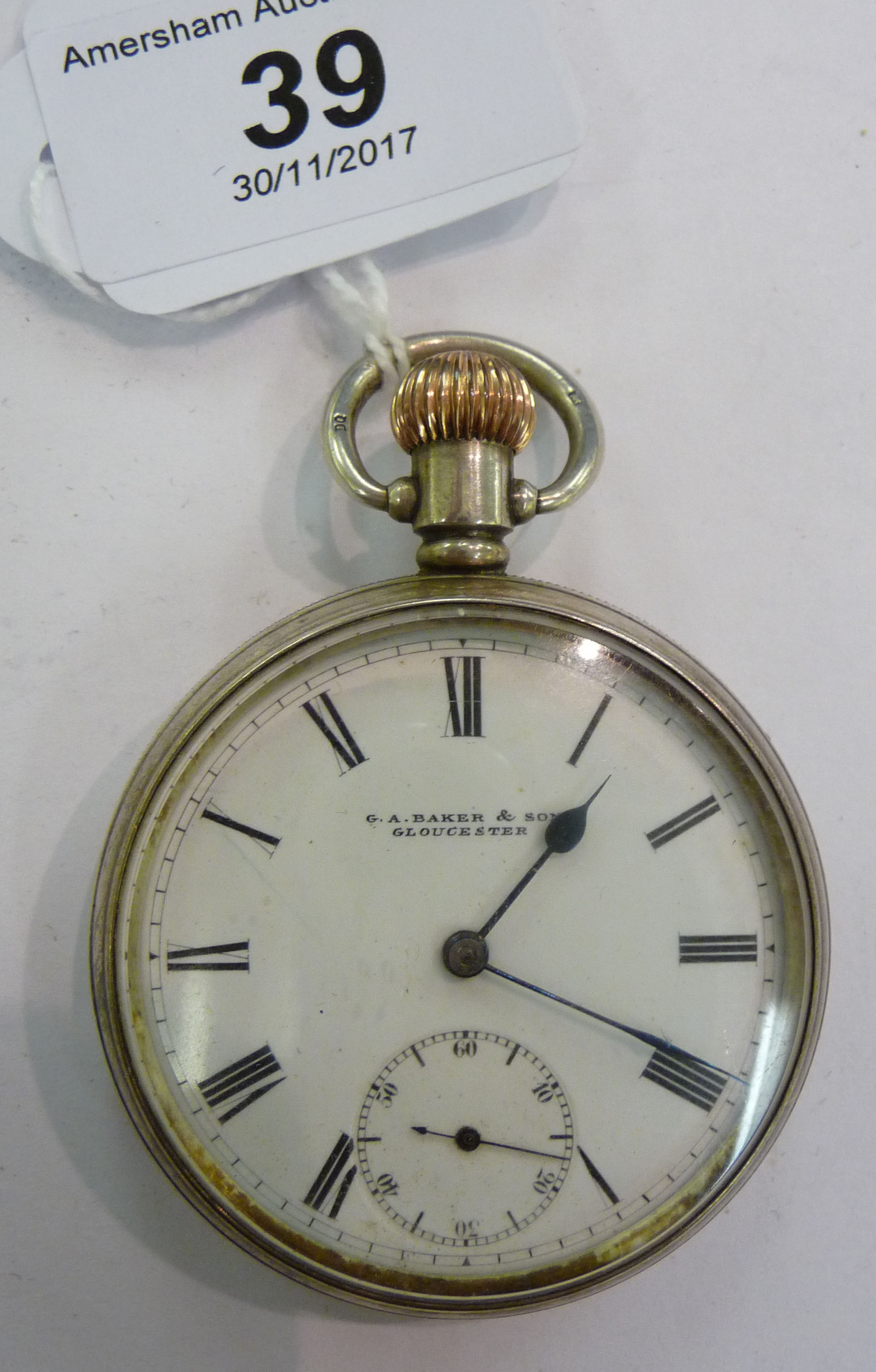 A silver cased open face pocket watch with engine turned decoration,