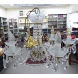 A moulded glass six branch chandelier with glass drops 23''spread RAF