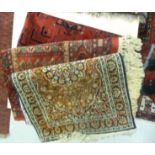 Three similar Persian rugs of various sizes on multi-coloured grounds largest 60'' x 84''