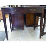 A mid/late 19thC ebony and string inlaid mahogany side table with a single drawer, raised on square,