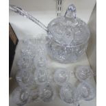 A modern lead crystal punch bowl, cover, ladle and fourteen cups, decorated with slice,