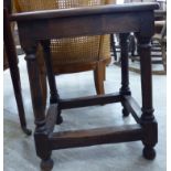 A George III style oak joint stool, the top with a thumb moulded edge, raised on turned legs,