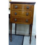 A modern Edwardian design satinwood inlaid mahogany three drawer bedside chest,
