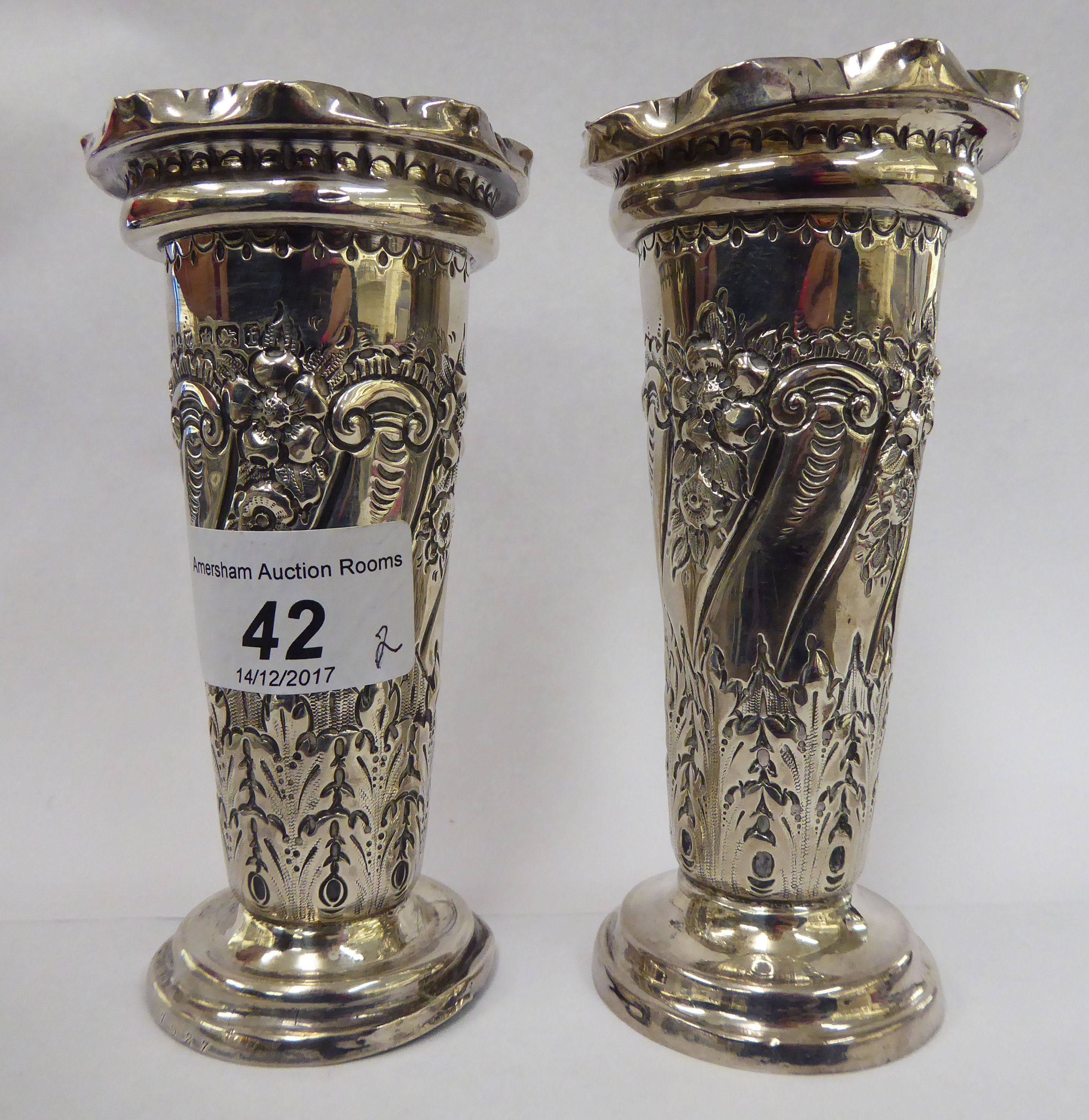 A pair of late Victorian silver specimen vases of trumpet design with embossed swag decoration - Image 2 of 5