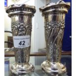 A pair of late Victorian silver specimen vases of trumpet design with embossed swag decoration