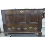 A late 18thC oak chest,