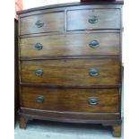 A late Victorian mahogany bow front dressing chest with two short/three long drawers,