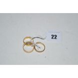 Three 18ct. yellow gold wedding bands, various designs, 10.9grms gross (various sizes).