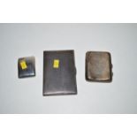 Two silver cigarette cases; and a snuff box, 10.6oz gross.