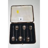 A set of six bean finial coffee spoons, in fitted case.