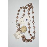 A mother-of-pearl and silver bead necklace,