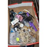 A large quantity of costume watches; and costume jewellery.