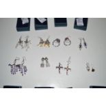 Eight pairs of mainly gem set earrings.