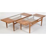 G-Plan: two teak fresco pattern coffee tables, with glazed centre tops, 137 x 51 x 43cms high.