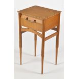 A 1980's teak bedside table, fitted a single drawer with metal handle,