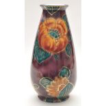 Burleigh Ware: a lustreware elongated vase, with flared rim and flower decoration,