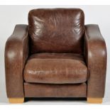 Siren Furniture Ltd: a brown leather armchair, on light wood feet, 97 x 90 x 75cms high.