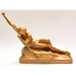 After George Maxim: a gold painted terracotta figure with harpoon slaying a fish,