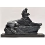 A reproduction bronze effect model of a roaring lion, after L.