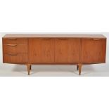 Mackintosh Furniture: a teak sideboard, fitted three drawers and three cupboard doors,