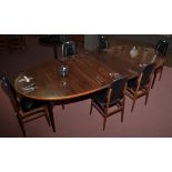 Sibast Furniture, Denmark: a rosewood extending dining table, fitted two extension leaves,