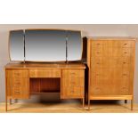 Vanson: a dark stained wood chest of five long drawers,