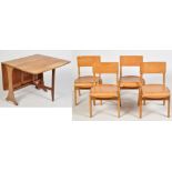 G-Plan: a teak drop leaf dining table, fitted gate action,