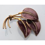 Hans Myhre, Norway: a silver gilt and purple enamel leaf pattern brooch, 5cms wide.