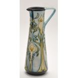 Moorcroft: a 'Calla Lily' pattern ewer, probably by Emma Bossons, marked to base,